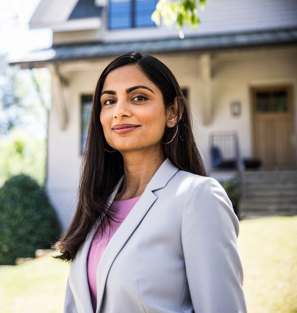 Headshot of a accomplished female executive with an Indian background, symbolizing leadership excellence and diversity in the business world