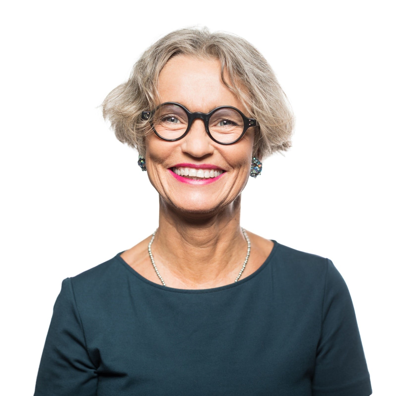 Headshot of a seasoned female executive, exemplifying leadership excellence and notable contributions in her professional journey