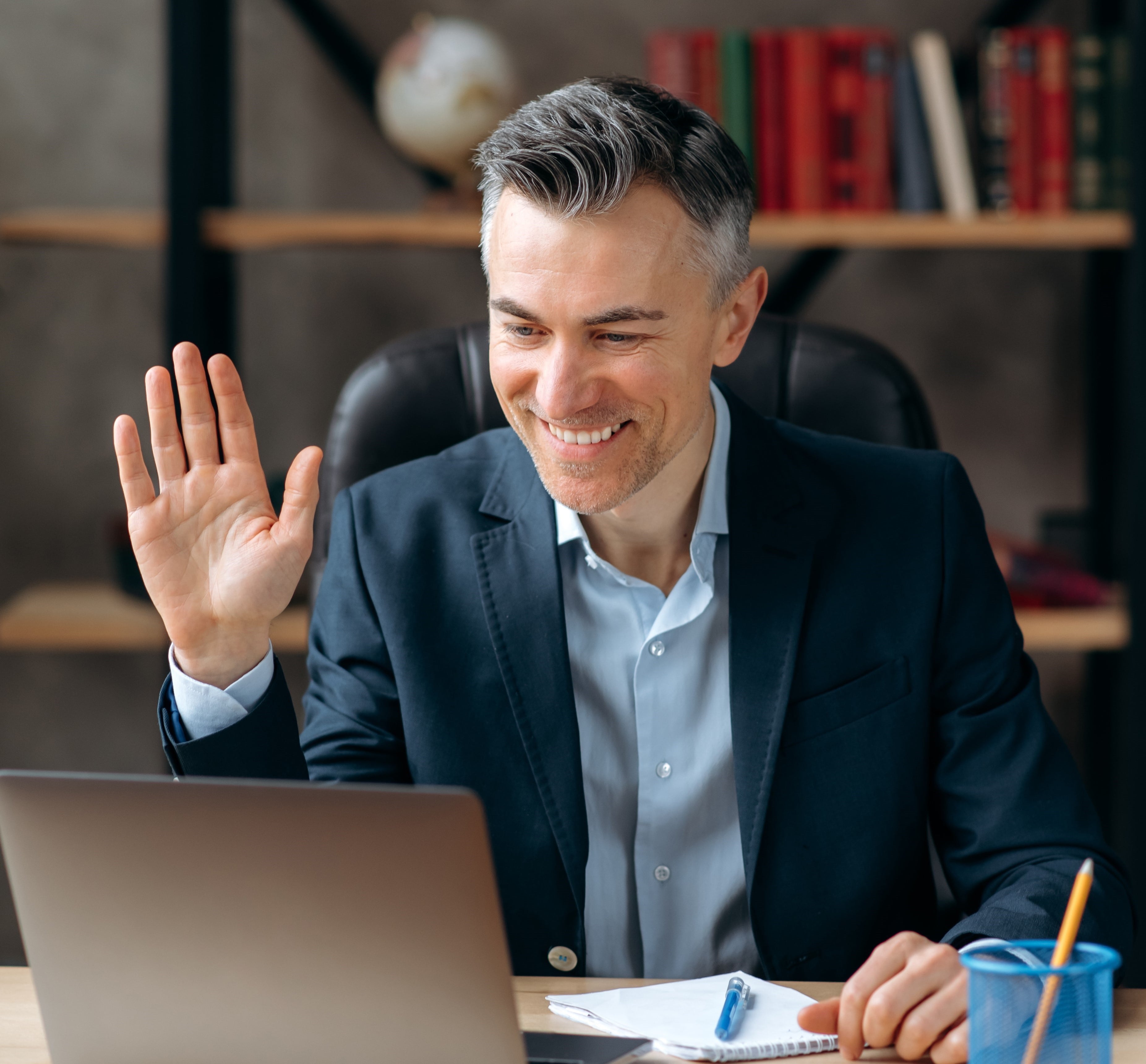 Image of a male executive actively participating in an online executive coaching session